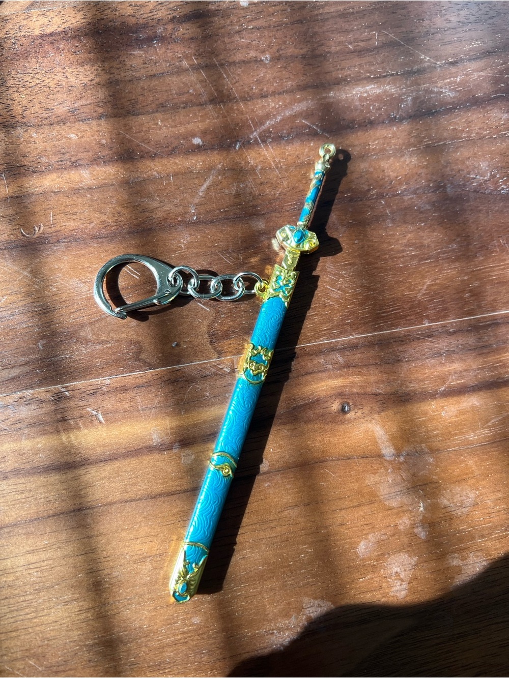 Turquoise Gold-Accent Decorative Keychain Sword